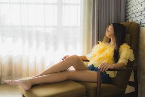 Portrait,Young,Asian,Woman,Relax,Happy,Smile,On,Sofa,Chair
